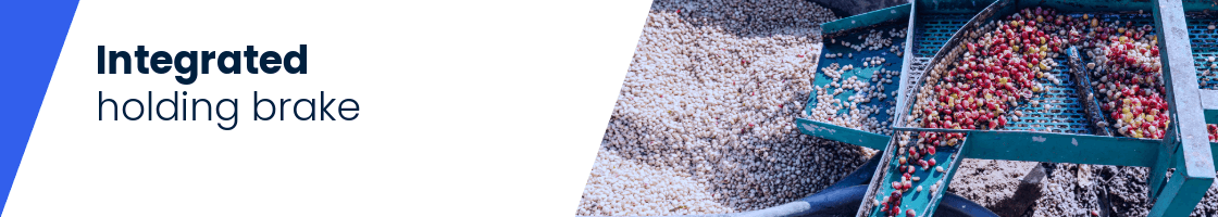 Close-up of an industrial sorting machine with several chambers full of small round objects and a control unit superimposed at the bottom right