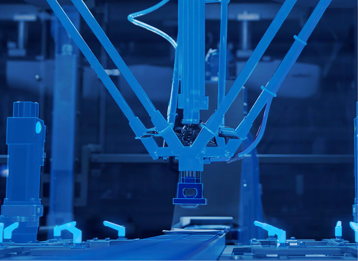 Digital twin of a robot cell transitioning into the real packaging system.
